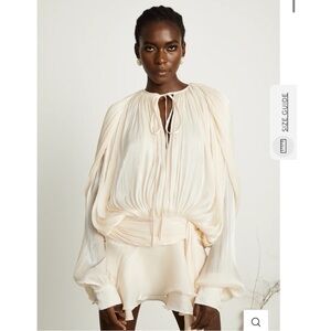 EUGÉNIE FULLY-PLEATED RUFFLED MINI DRESS IN NEUTRALS
